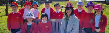 School children don hats in memory of Aaron